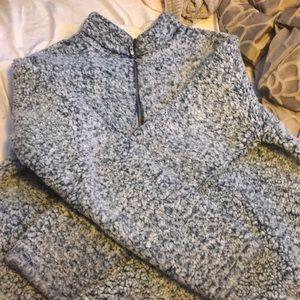 I am selling a fuzzy winter sweater.